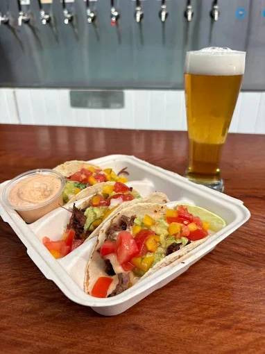 Taco x3 with a beer at the brewery - Freak Eats food truck gallery
