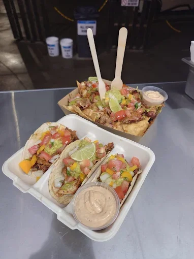 Tacos and nachos with dipping sauce - Freak Eats food truck gallery