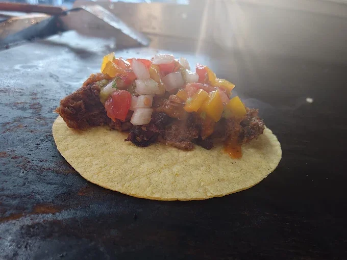 Freshly built taco on the flat top - Freak Eats food truck gallery
